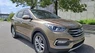 Hyundai Santa Fe 2.2D 4WD  2016 - Cần bán Hyundai Santa Fe 2.2D 4WD 2016, màu vàng đồng, 669tr