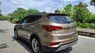 Hyundai Santa Fe 2.2D 4WD  2016 - Cần bán Hyundai Santa Fe 2.2D 4WD 2016, màu vàng đồng, 669tr